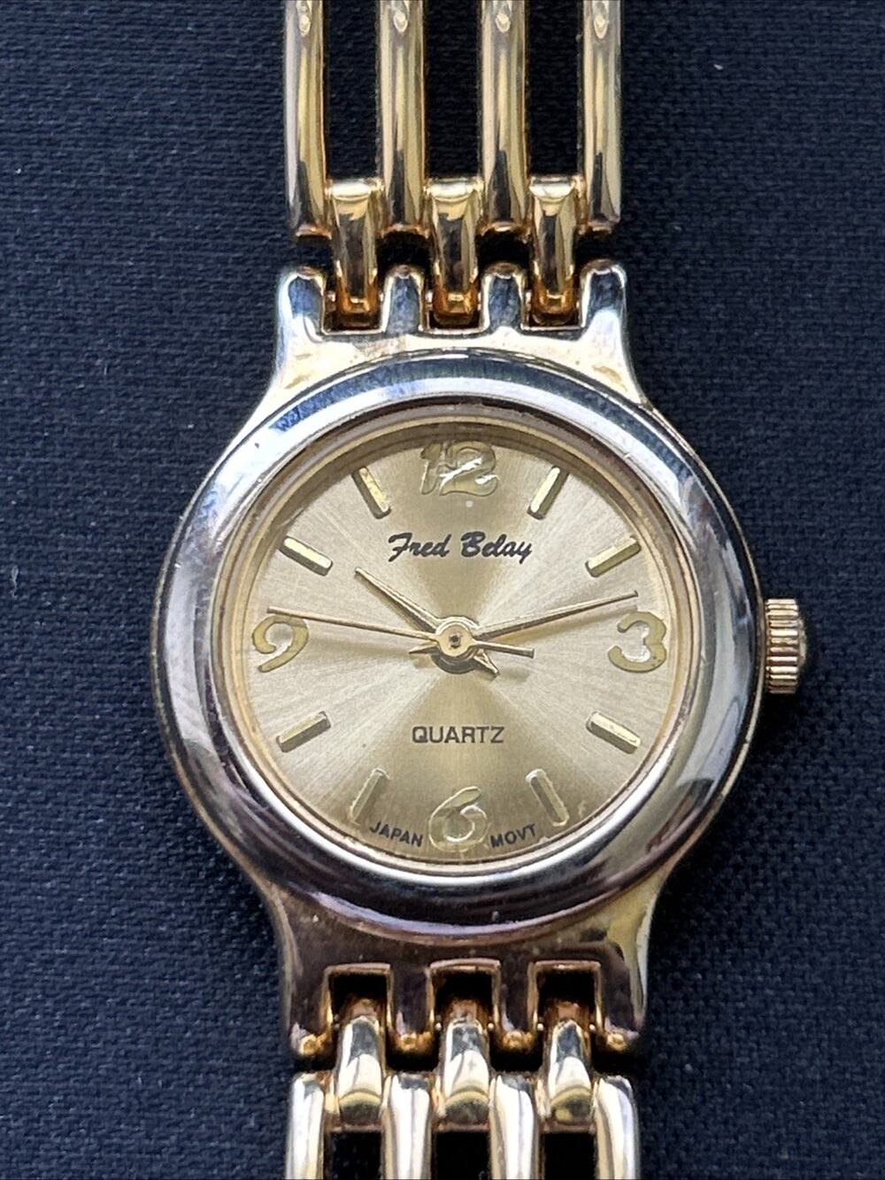 Fred Belay Gold Tone Silver Bezel Women’s Quartz Watch